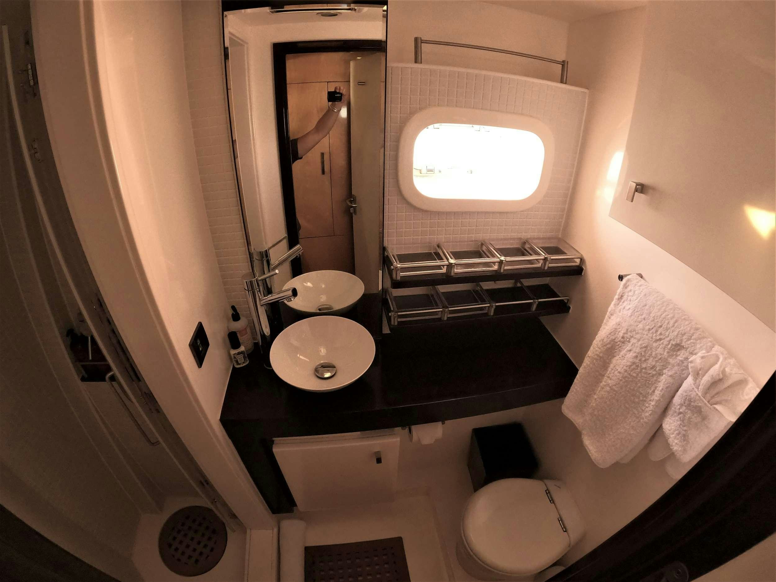 a bathroom with sinks and mirrors aboard SERENDIPITY Yacht for Charter