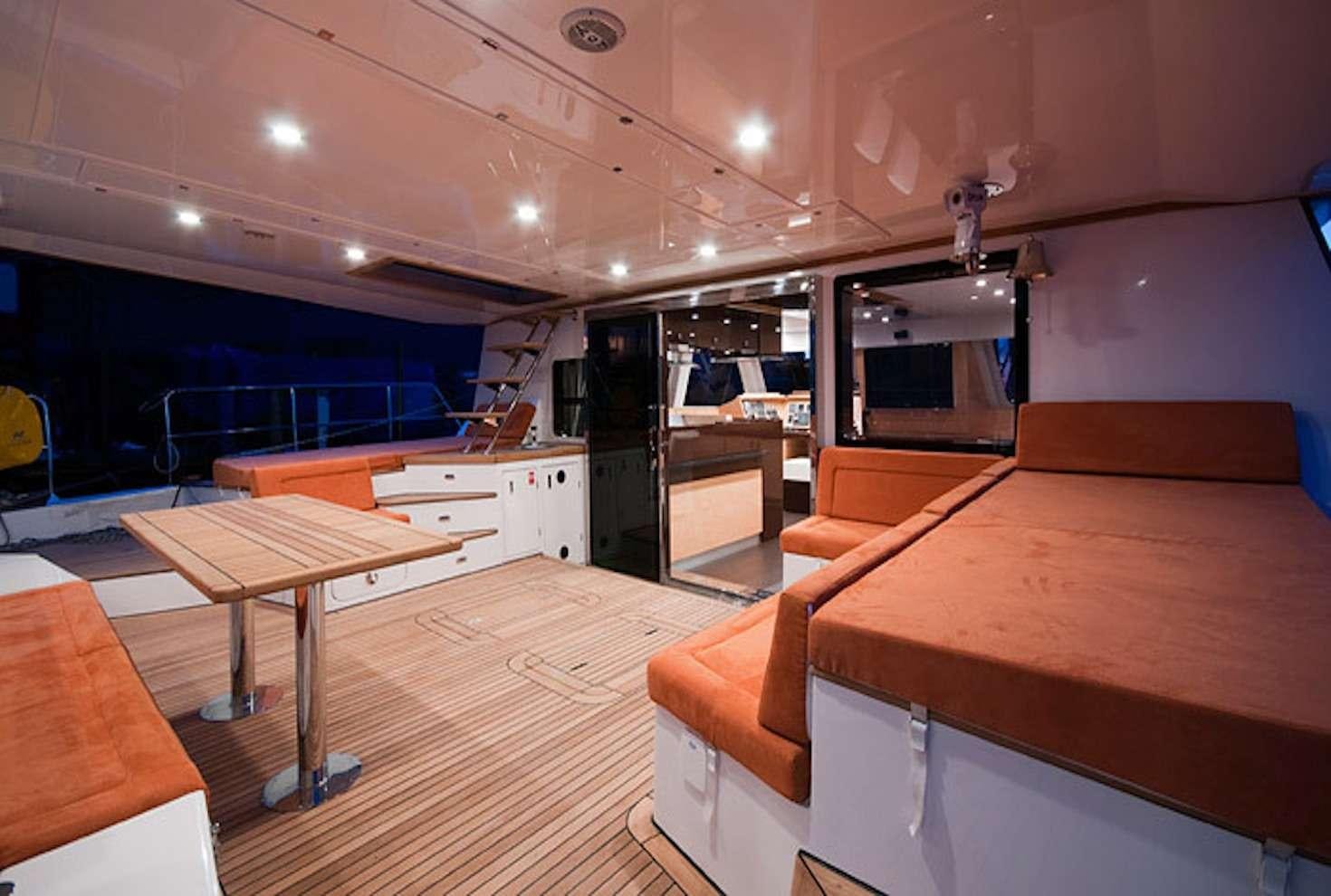 a room with a table and chairs aboard SERENDIPITY Yacht for Charter