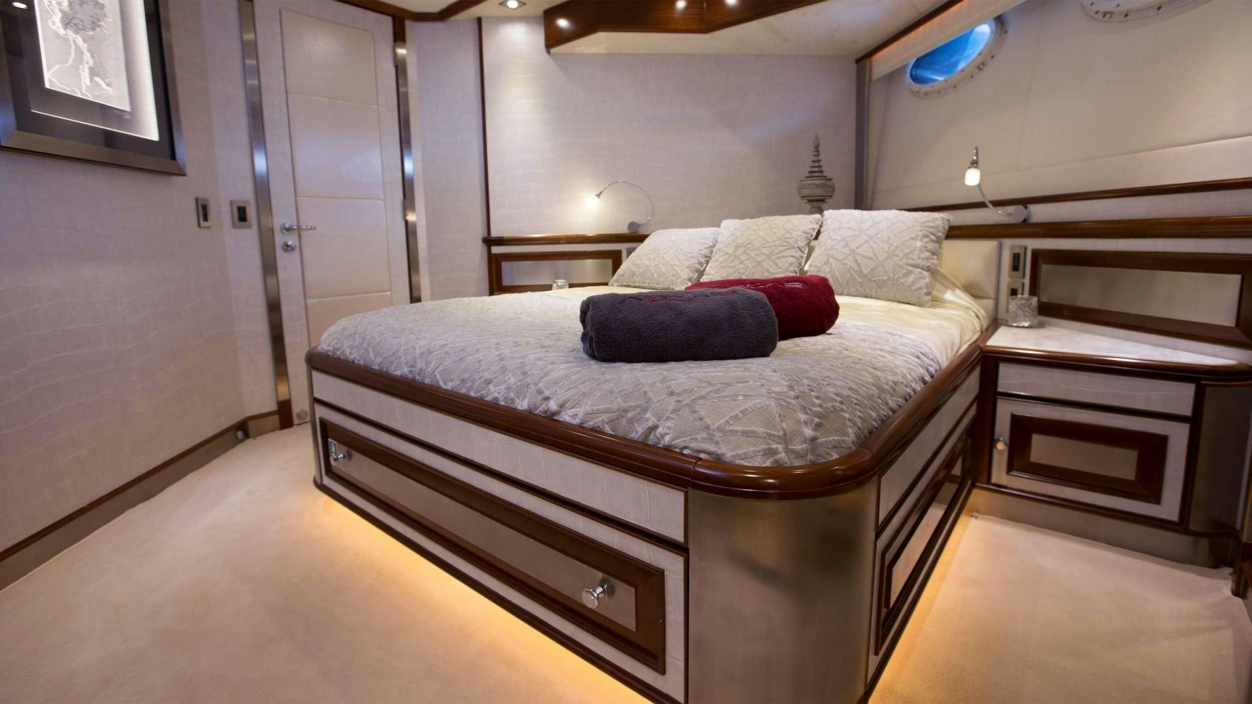 a bed in a room aboard SETTE Yacht for Charter