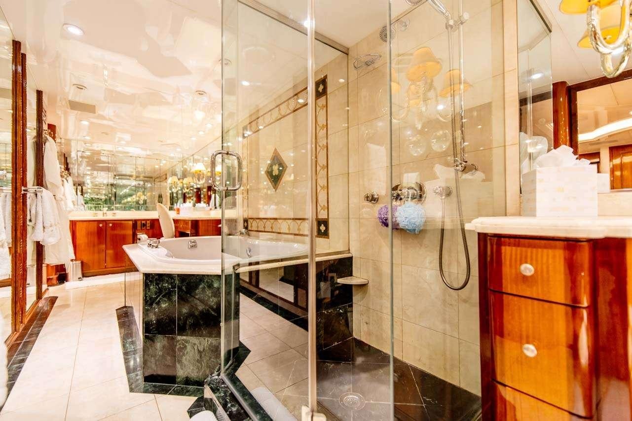 a bathroom with a large glass shower aboard SUMMERTIME II Yacht for Charter