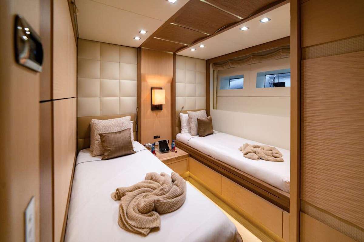 a couple of beds in a hotel room aboard LEUDIN I Yacht for Charter