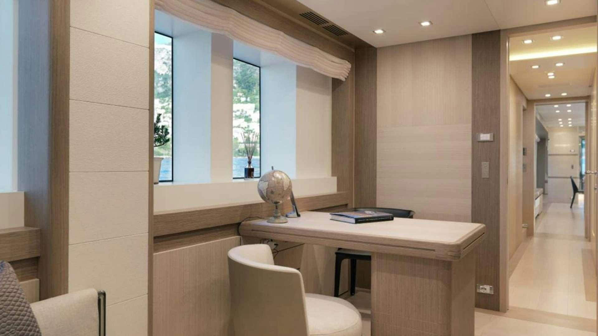 a desk in a room aboard LEUDIN I Yacht for Charter