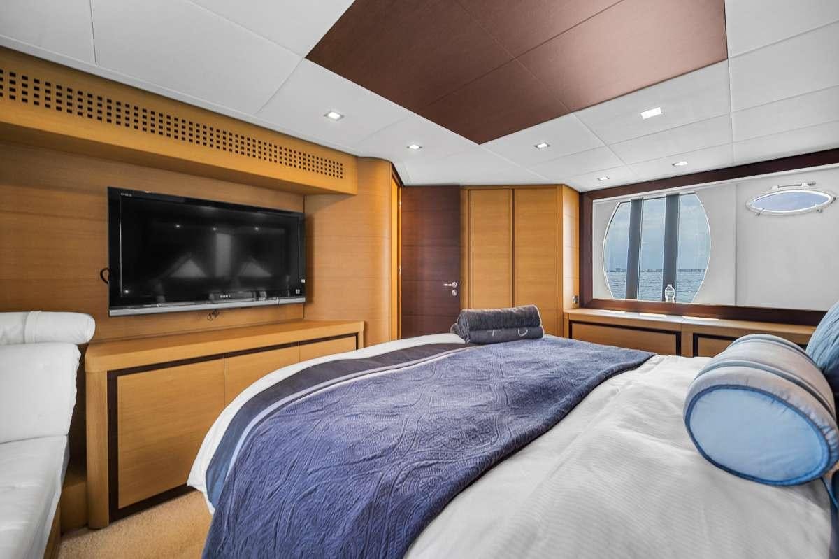 a bed in a room aboard VANTAGE Yacht for Charter