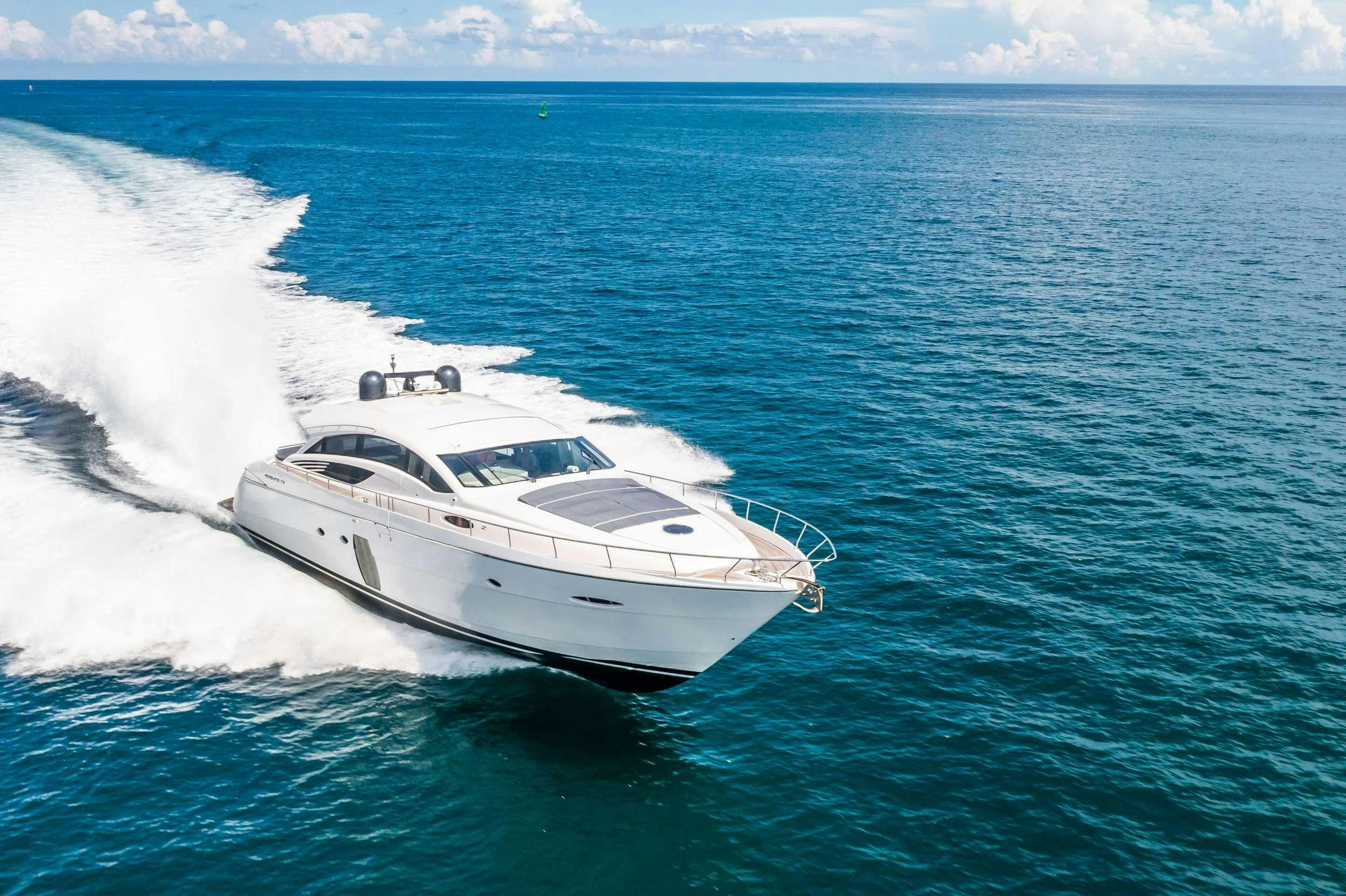 a white yacht in the water aboard VANTAGE Yacht for Charter