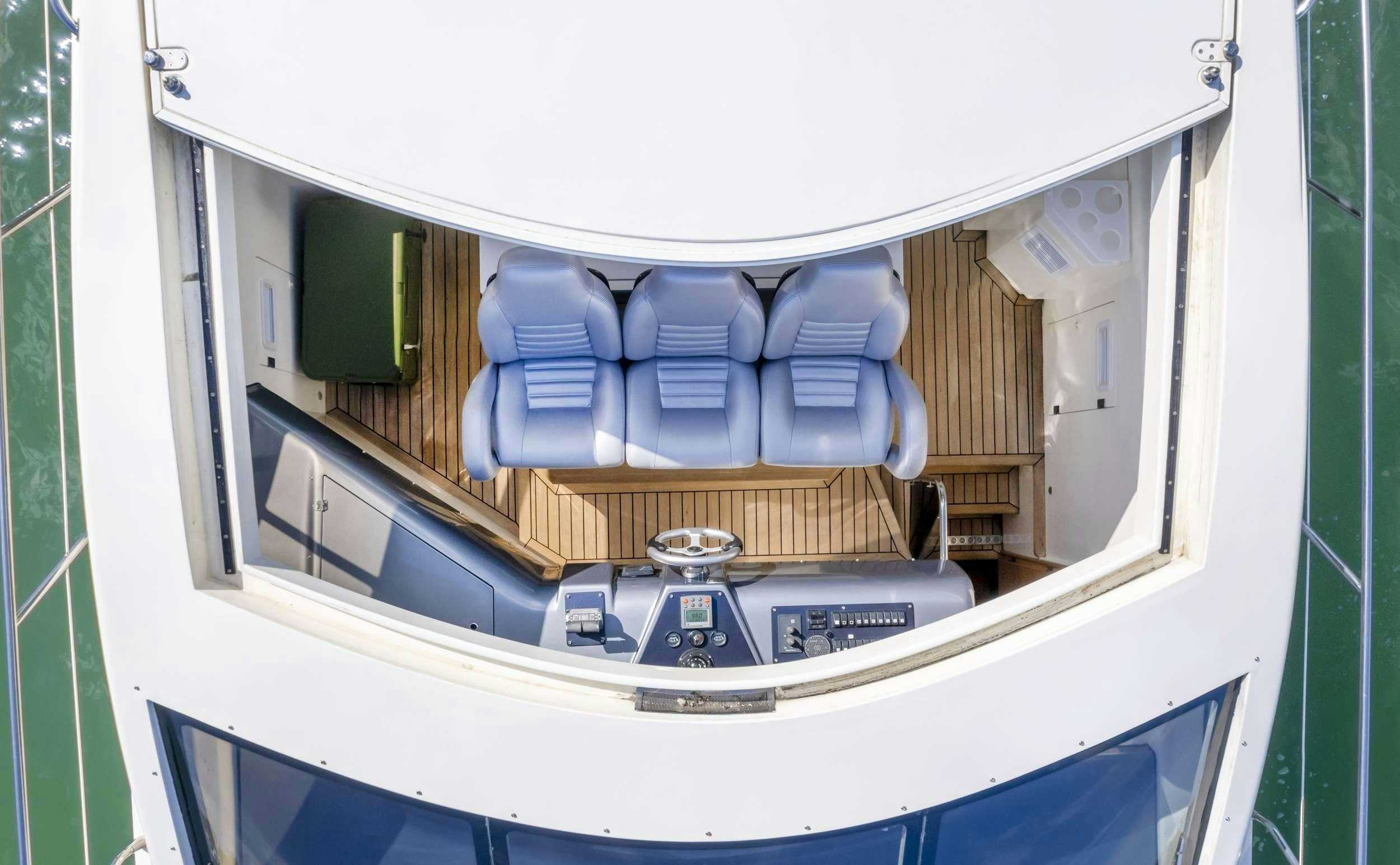 a white and blue object with a silver object on it aboard DIVA Yacht for Charter