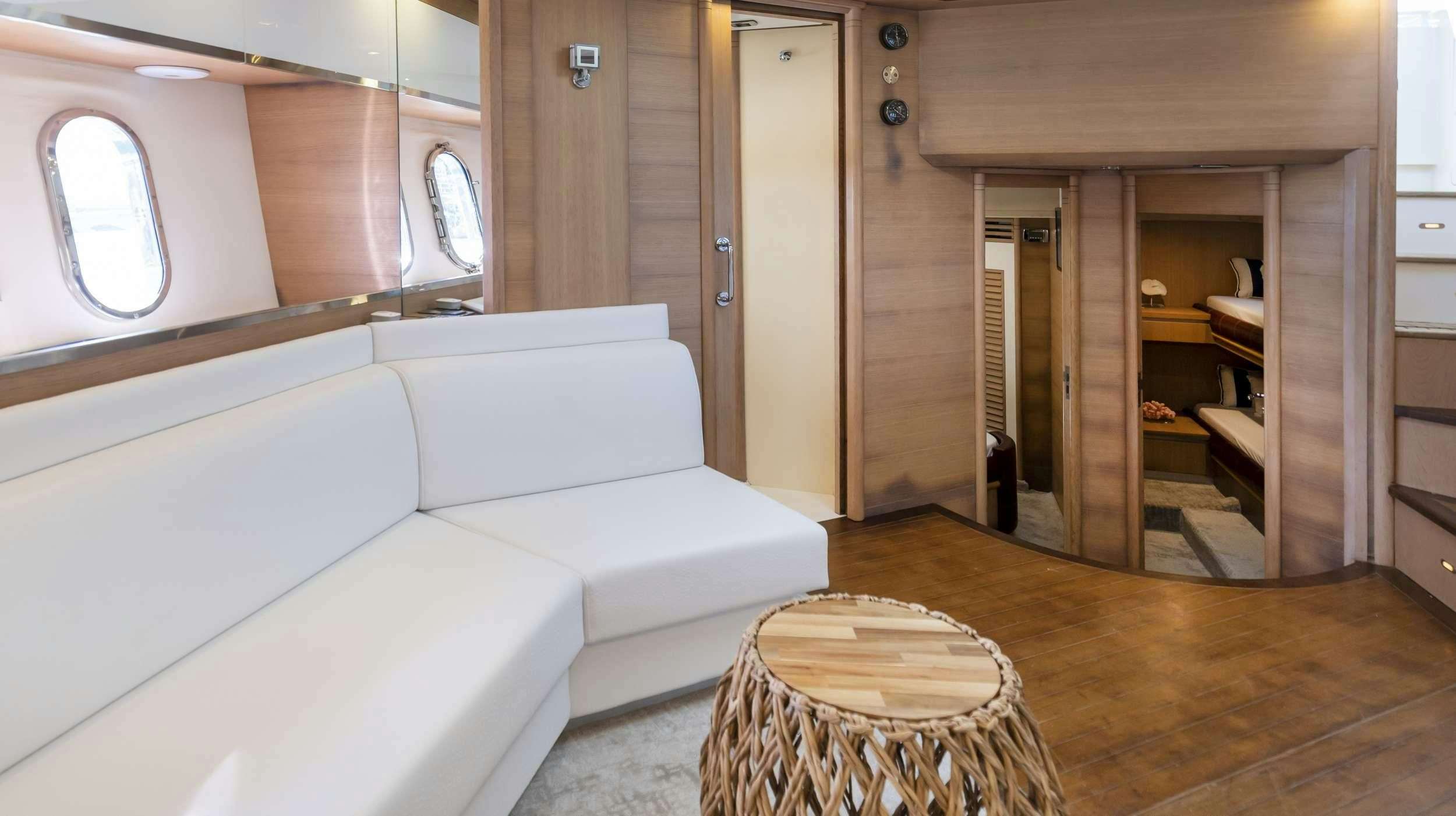 a living room with a couch aboard DIVA Yacht for Charter