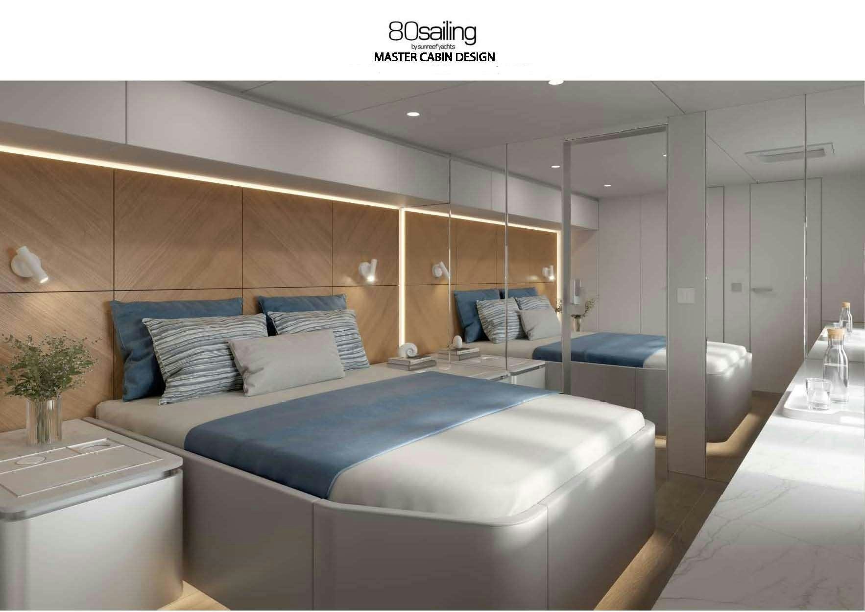 a room with a bed and a desk aboard OHANA Yacht for Charter