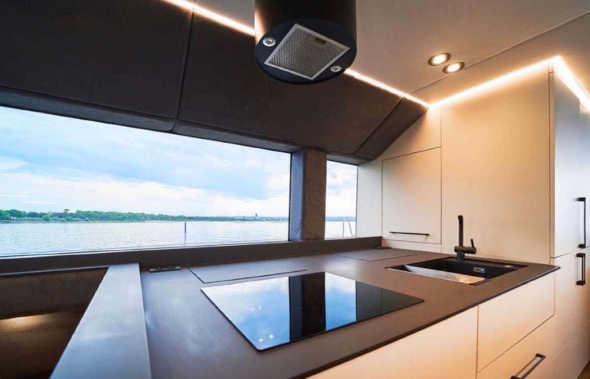 a large window above a sink aboard MOON DRAGON Yacht for Charter
