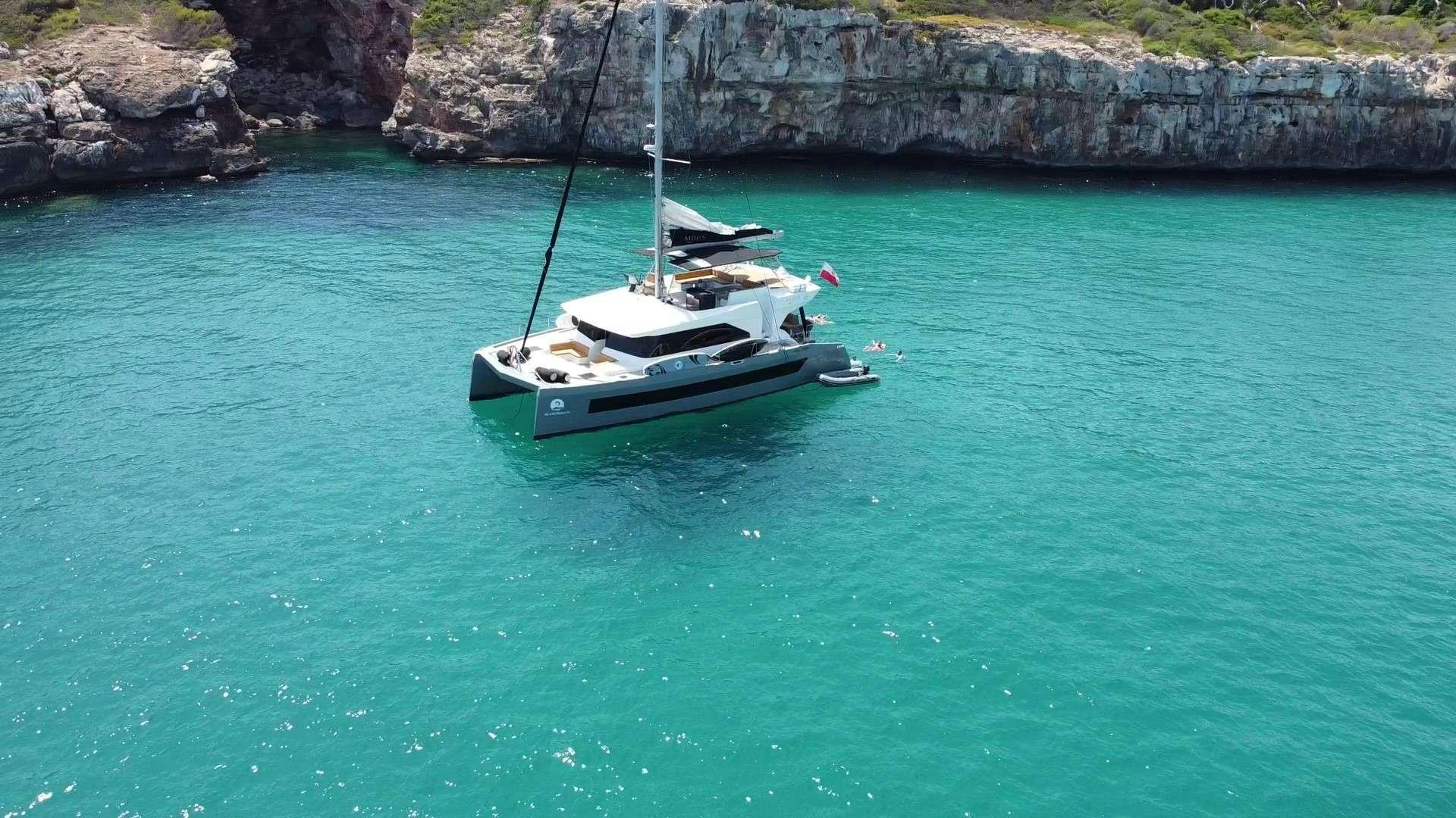 a boat on the water aboard MOON DRAGON Yacht for Charter