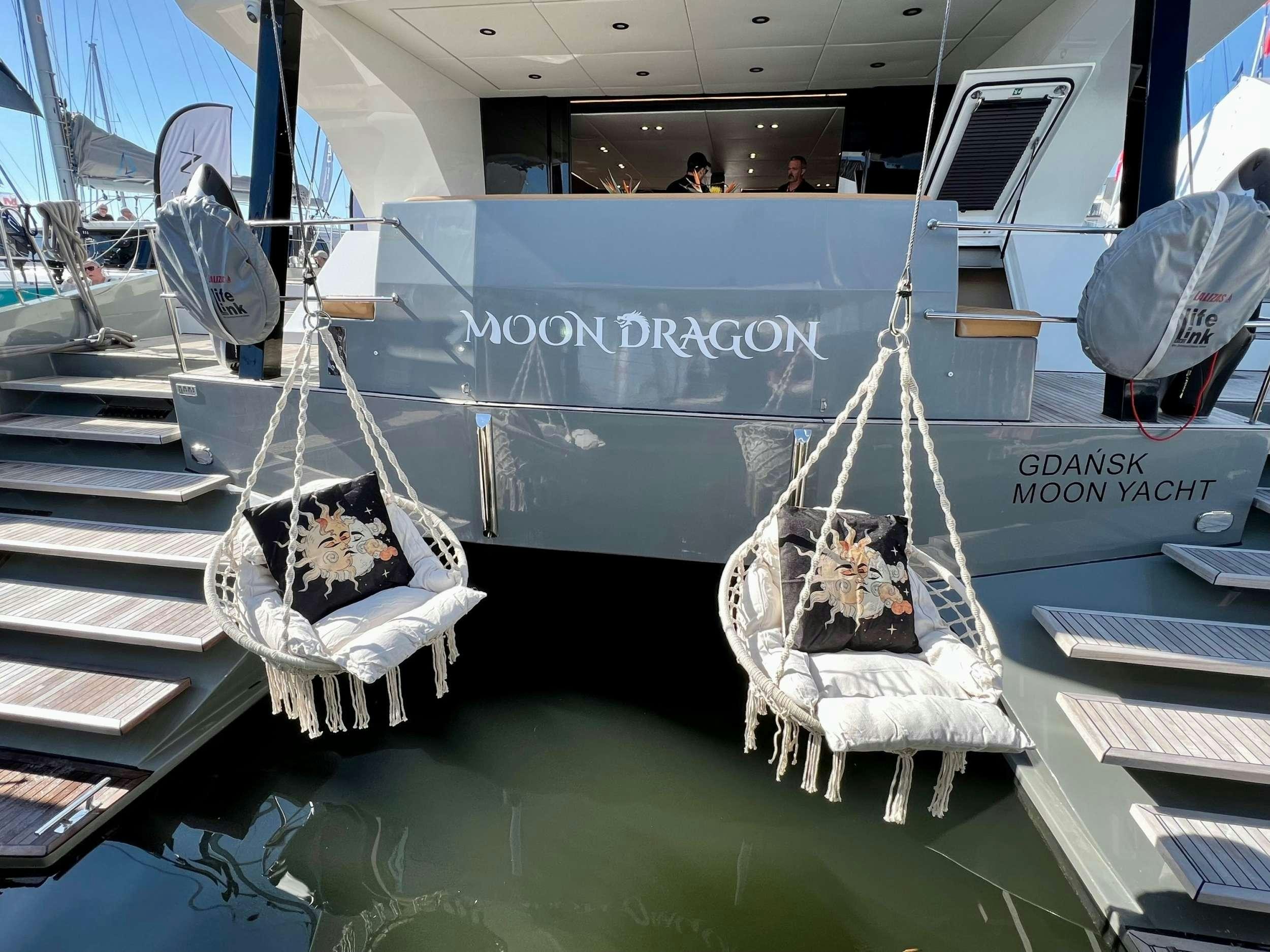 a model of a boat aboard MOON DRAGON Yacht for Charter