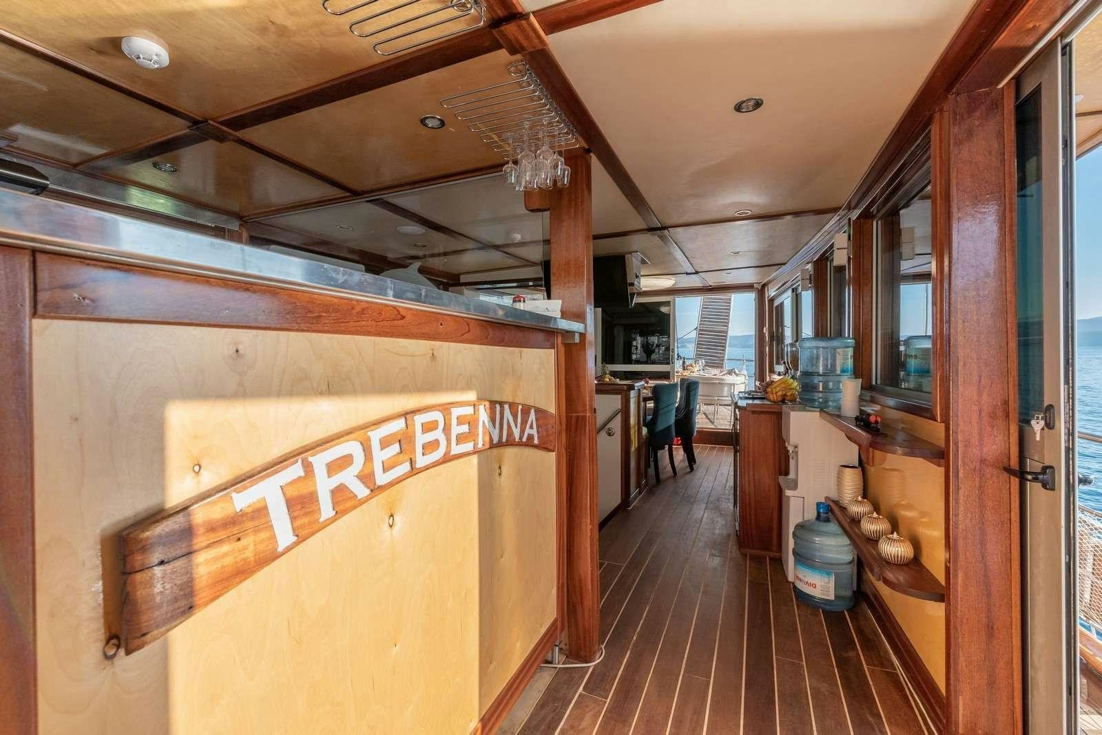 a wood shop with wood walls aboard Trebenna Yacht for Charter