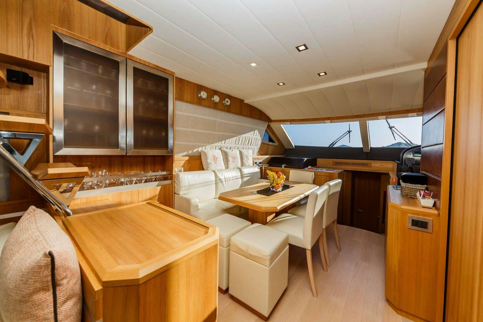 a kitchen and dining area aboard SECRET LIFE Yacht for Charter