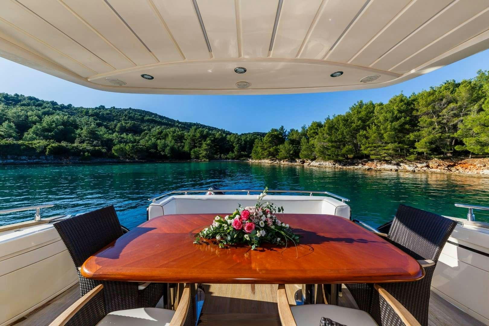 a table on a boat aboard SECRET LIFE Yacht for Charter