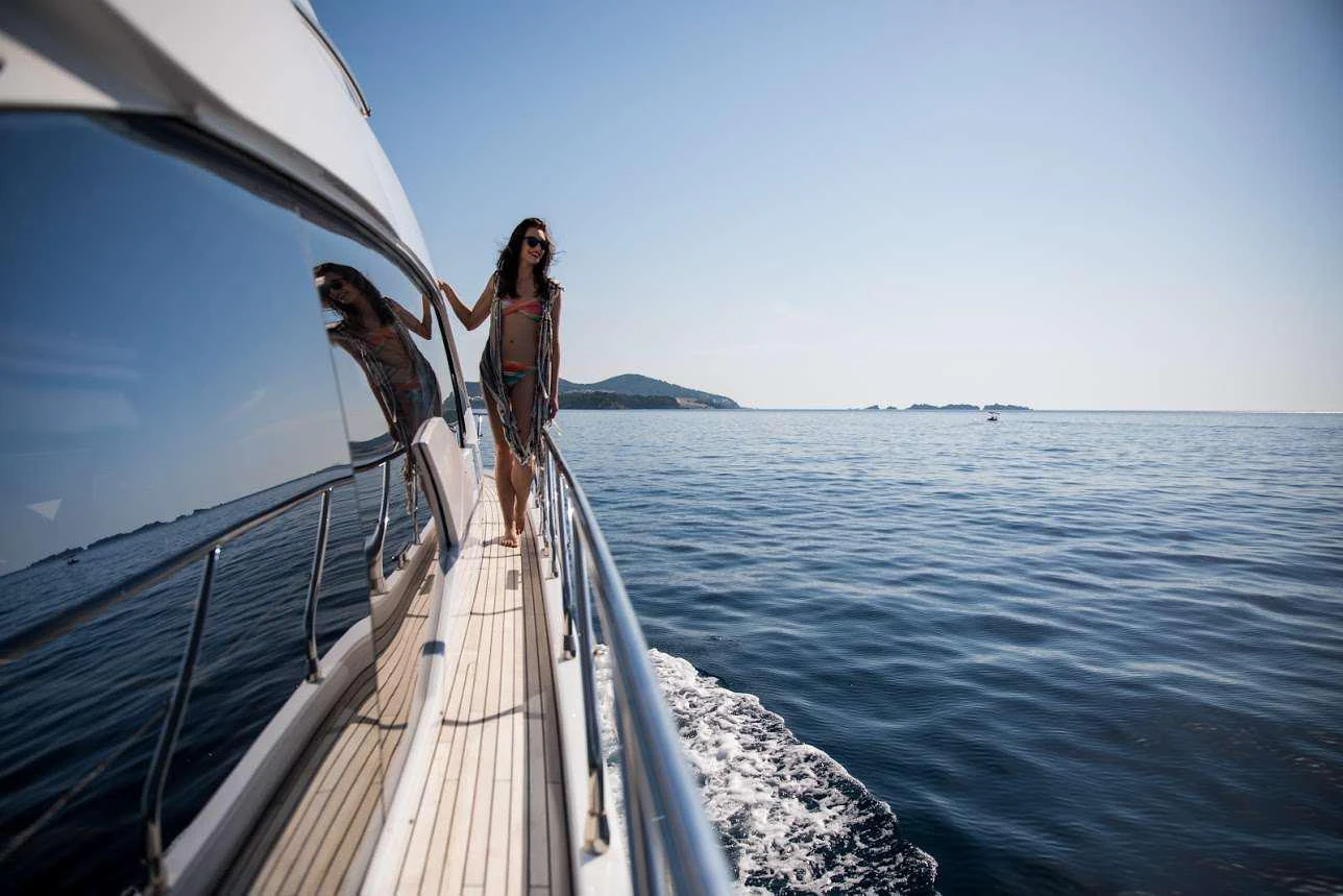 a person standing on a boat aboard TAMARA II Yacht for Charter
