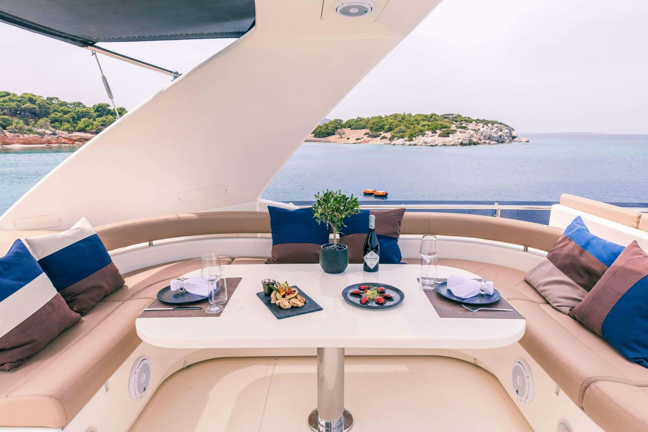 a table with food on it aboard ANNOUKA Yacht for Charter