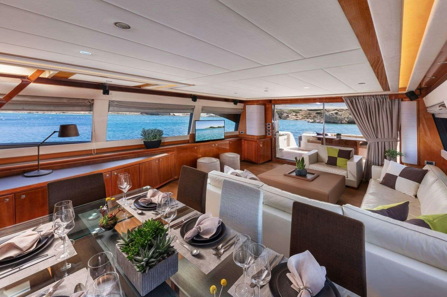 a large living room with a large balcony aboard ANNOUKA Yacht for Charter