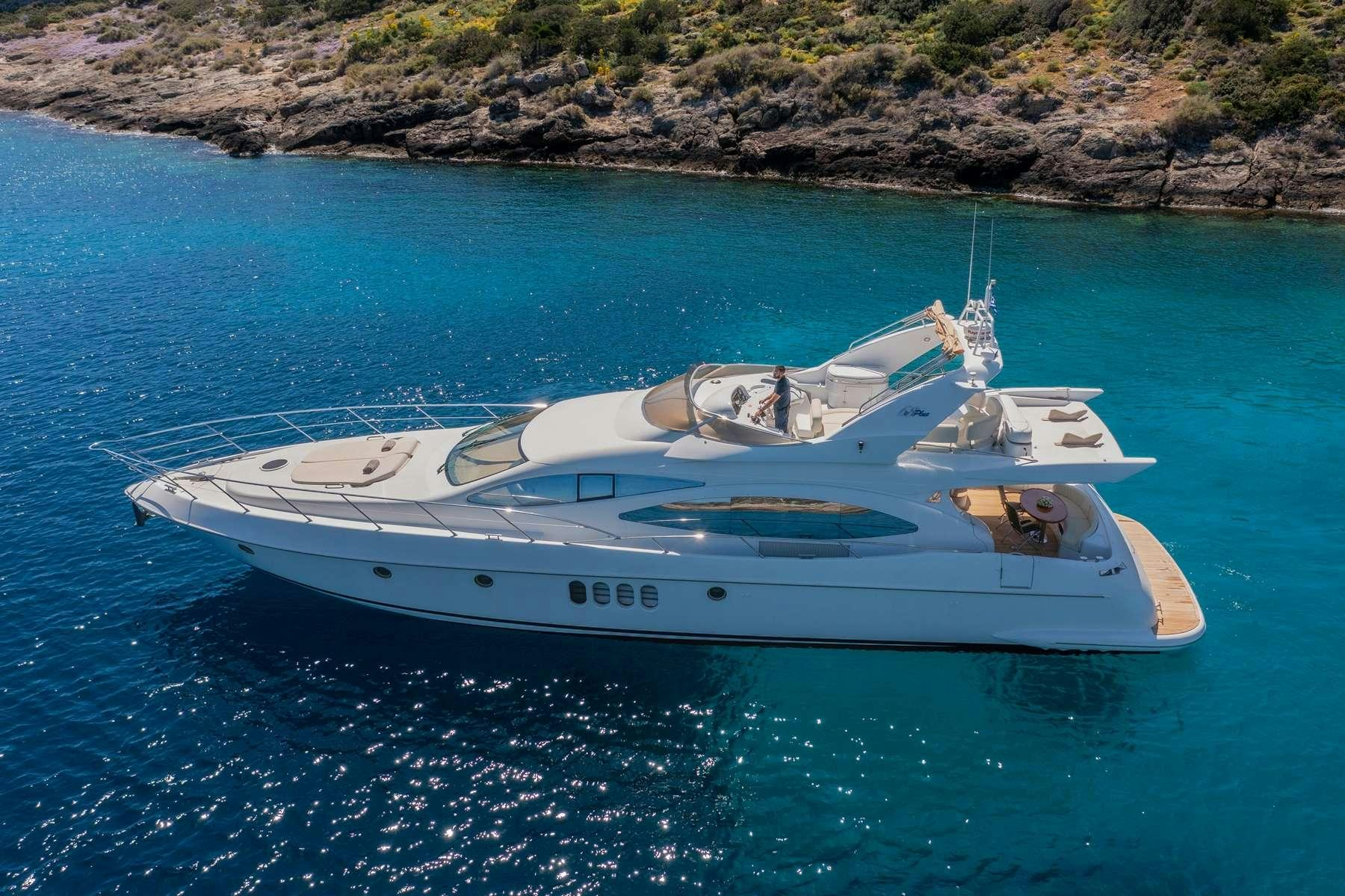 a white yacht in the water aboard DREAM Yacht for Charter
