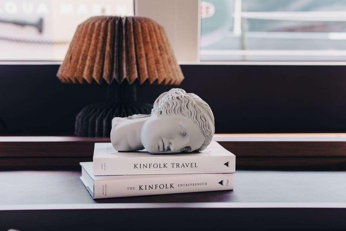 a couple of balls on a stack of books aboard VALIUM 67 Yacht for Charter