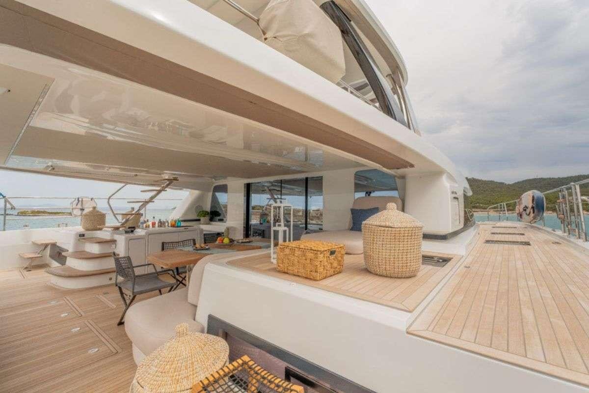 a modern house with a large open roof aboard VALIUM 67 Yacht for Charter