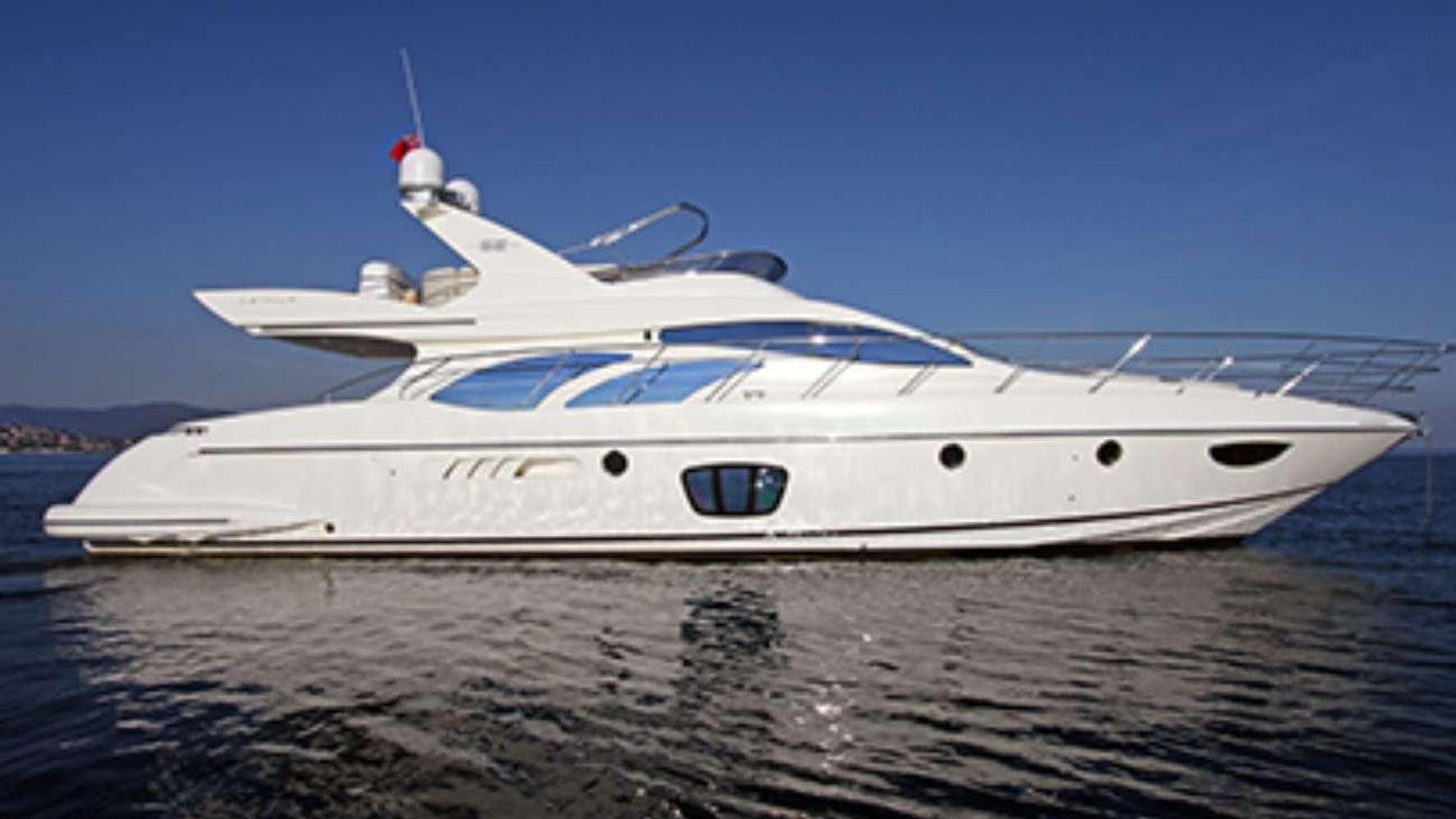 a white yacht on the water aboard GRACE Yacht for Charter