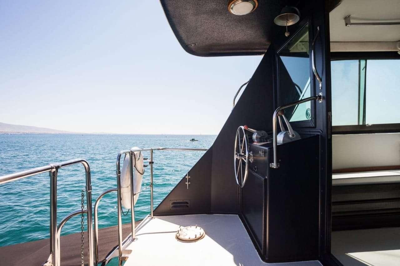 a boat with a door open aboard Theoxenia Yacht for Charter