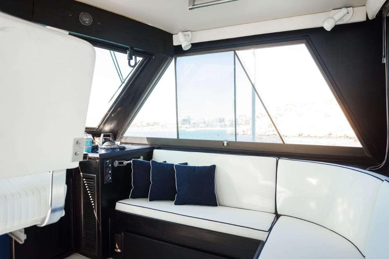 a bed in a room aboard Theoxenia Yacht for Charter