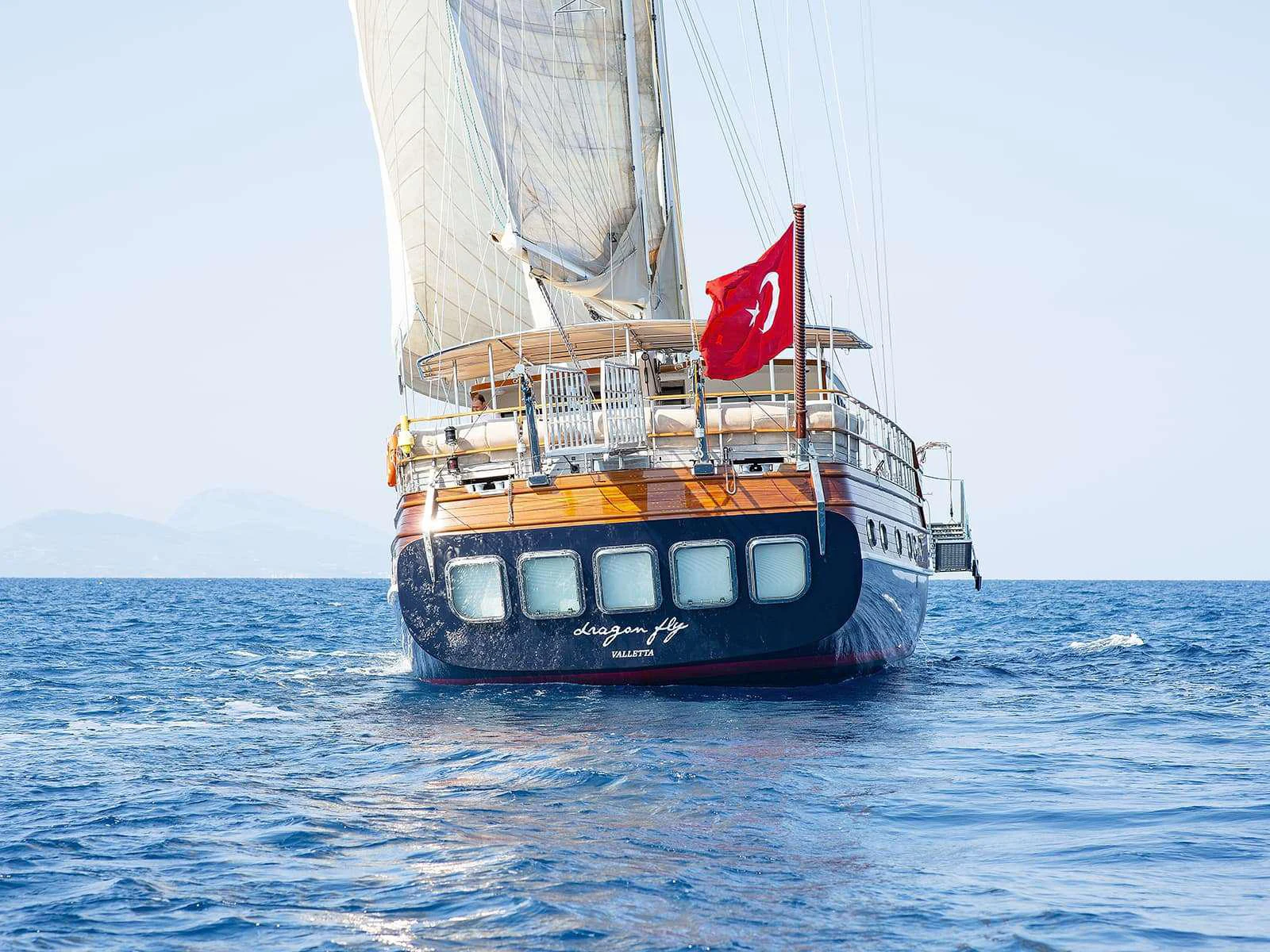 a boat on the water aboard RIVA Yacht for Charter