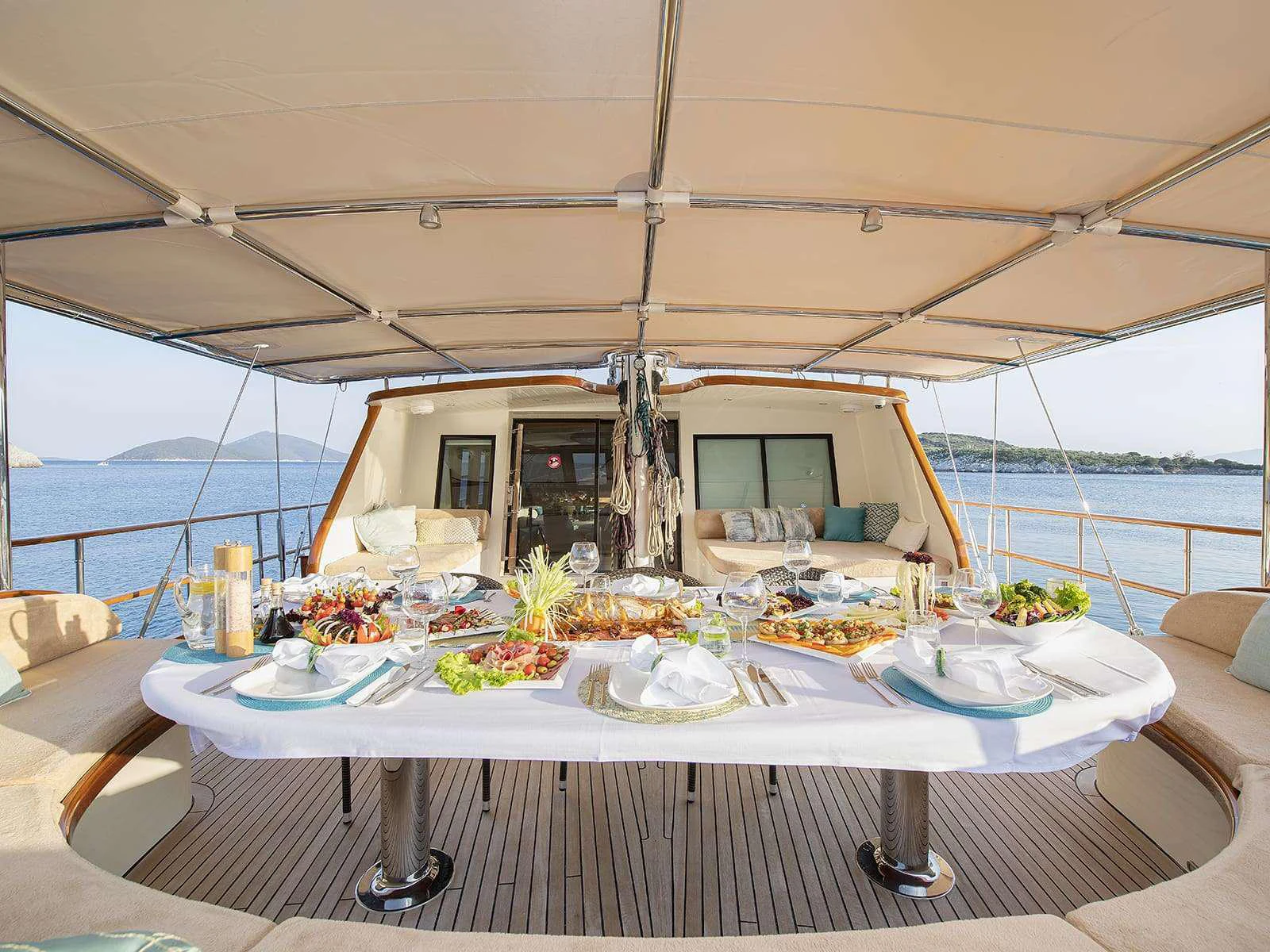 a table with food on it aboard RIVA Yacht for Charter