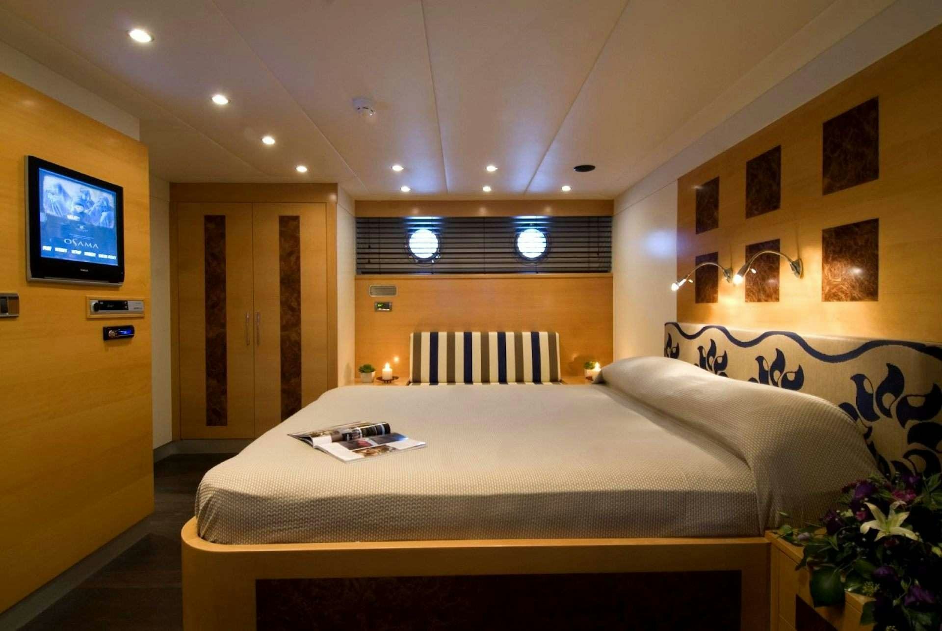 a bed in a room aboard TIGRA Yacht for Charter
