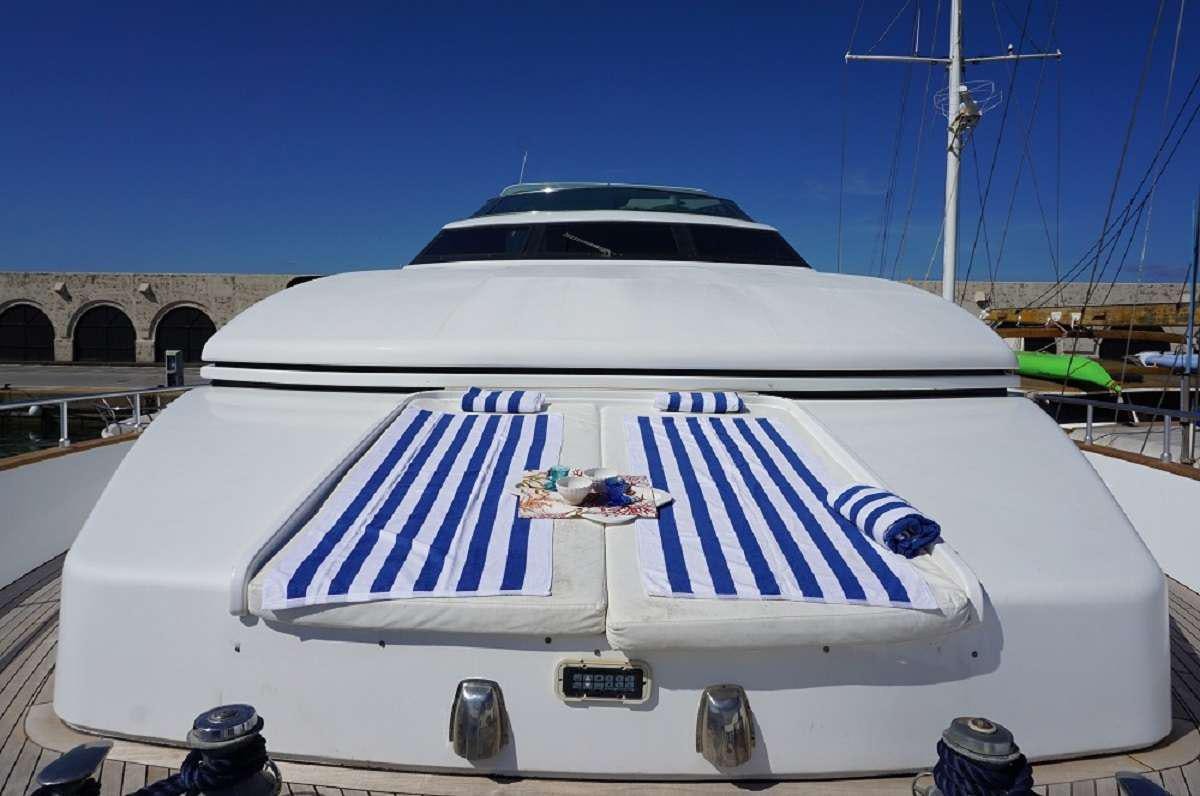 a white yacht in a dock aboard BALU 3 Yacht for Charter
