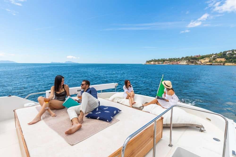a group of people on a boat aboard SHANGRA Yacht for Charter