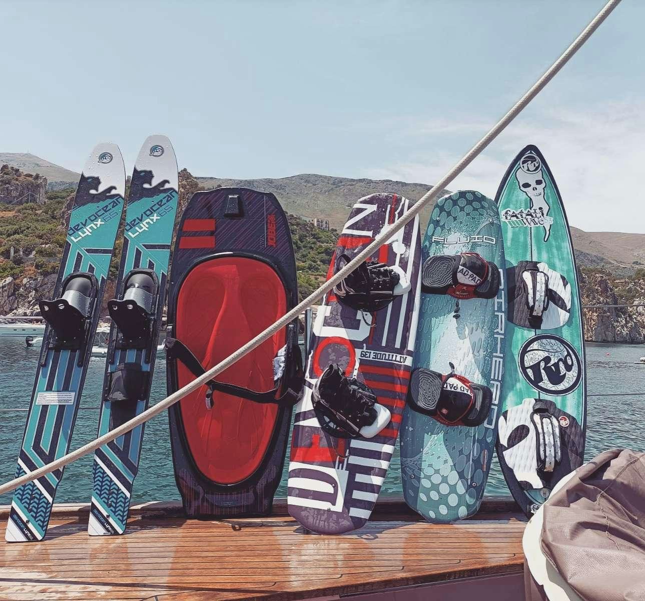 a group of snowboards on a boat aboard MALIZIA Yacht for Charter