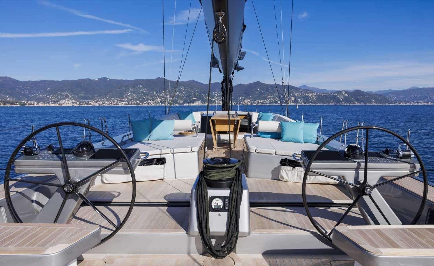 a boat with a steering wheel aboard MINDFULNESS Yacht for Charter