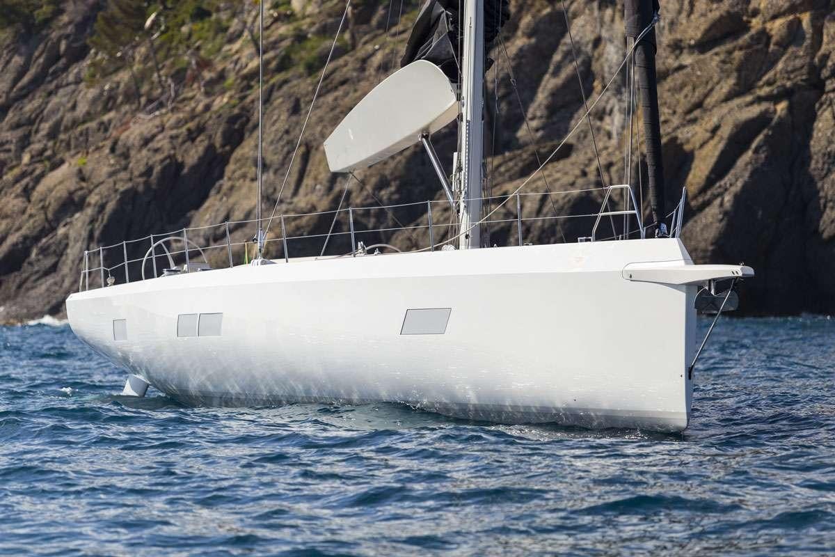 a white boat in the water aboard KARMA Yacht for Charter