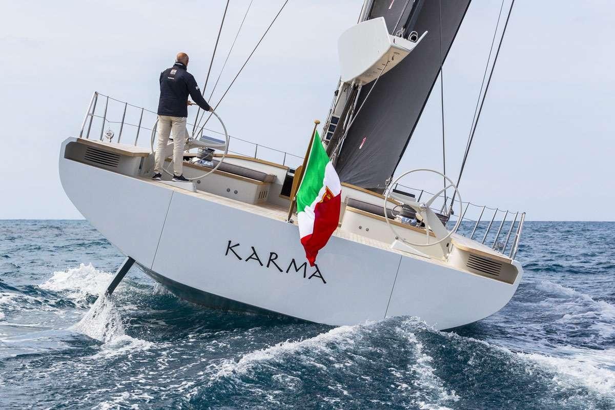 a man on a sailboat aboard KARMA Yacht for Charter