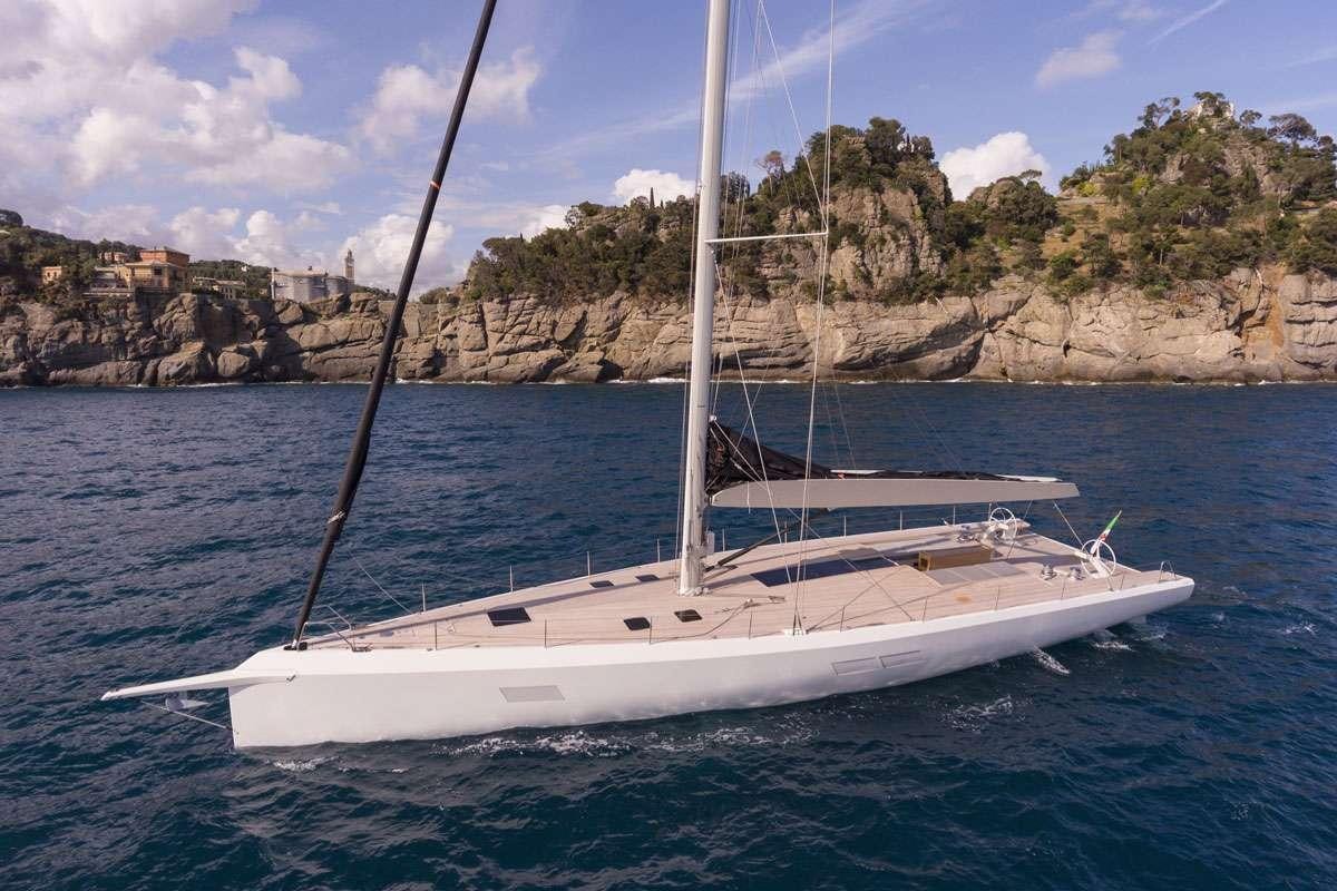 a white boat in the water aboard KARMA Yacht for Charter