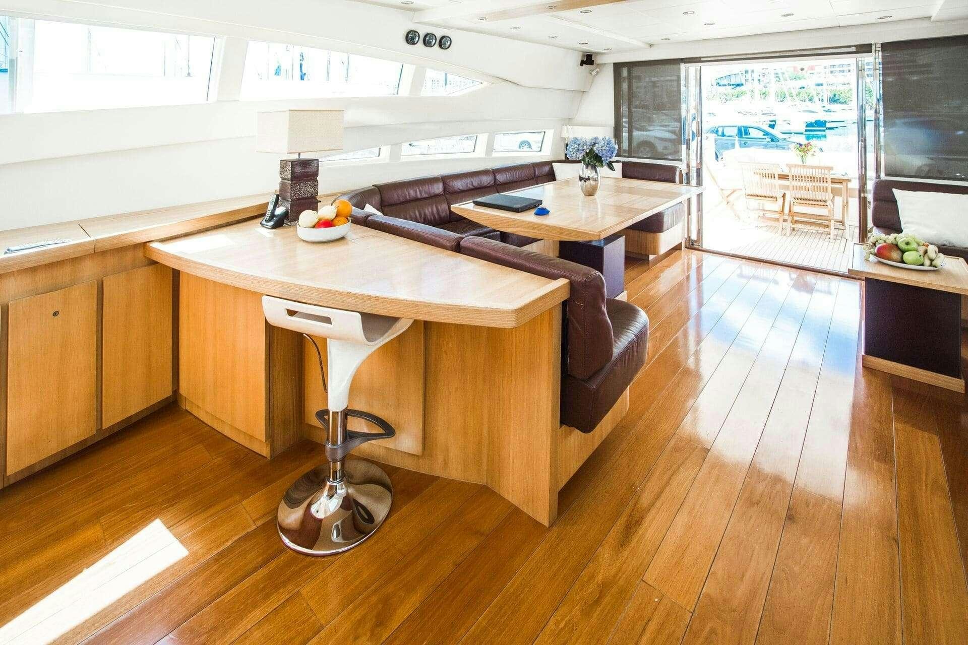 a room with a desk and a chair aboard DOUBLE D Yacht for Charter