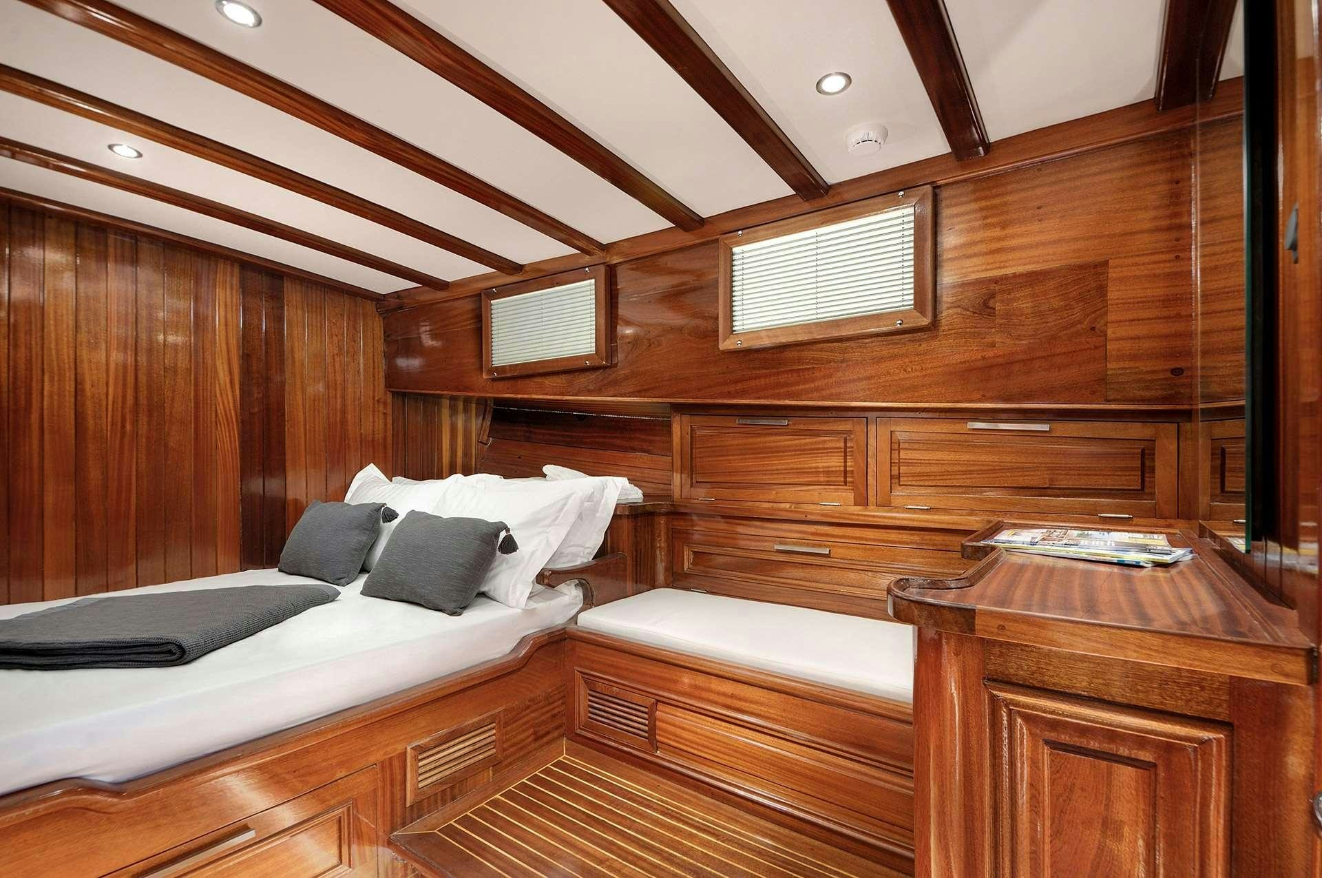 a room with two beds aboard SERENAD A Yacht for Charter