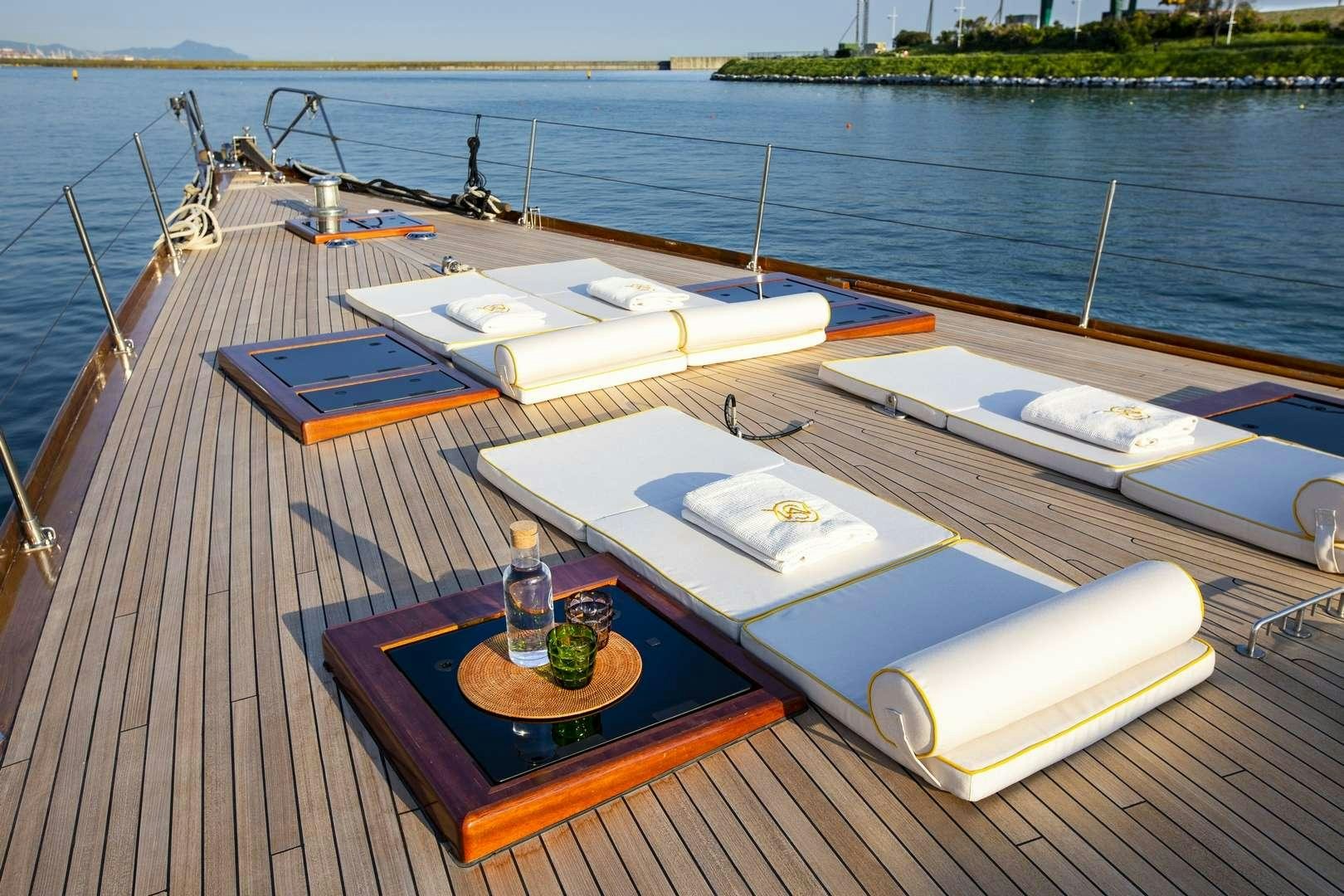 a boat on a deck aboard QUARTA SANTA MARIA Yacht for Charter