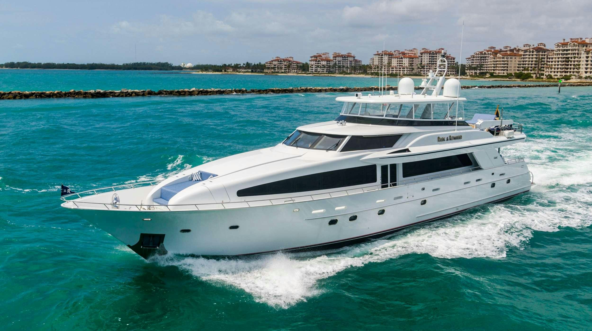 a white yacht on the water aboard RISK & REWARD Yacht for Charter