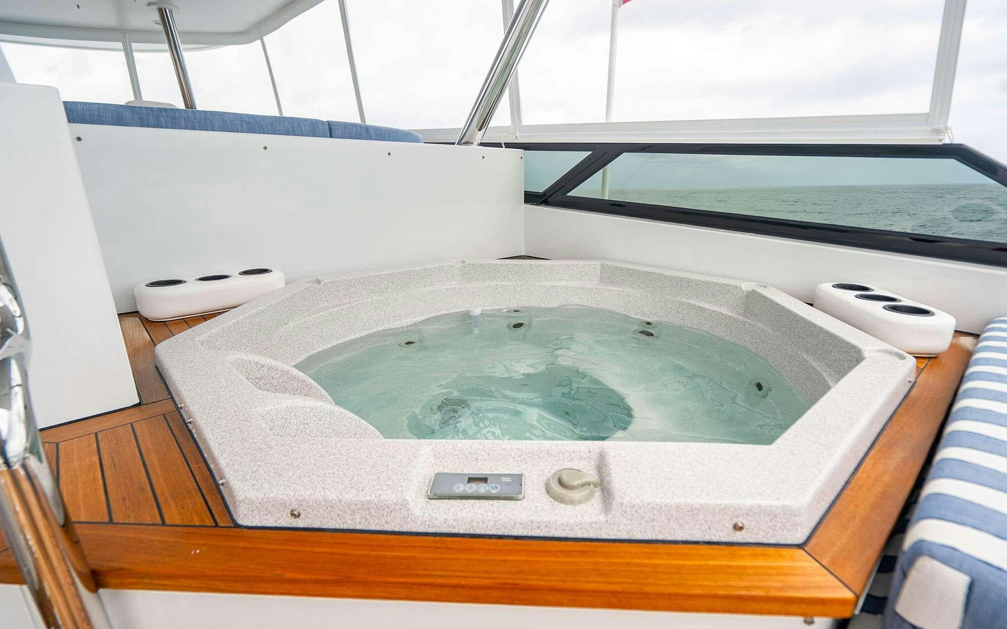 a rectangular object with a round object in it aboard RISK & REWARD Yacht for Charter