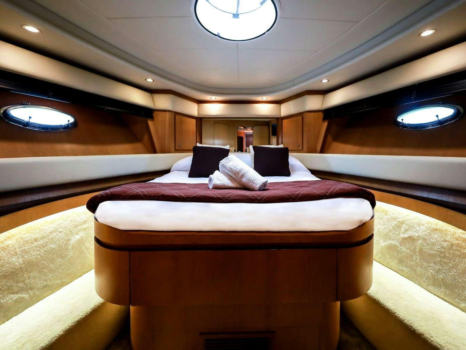 a bed in a train aboard EVA II Yacht for Charter
