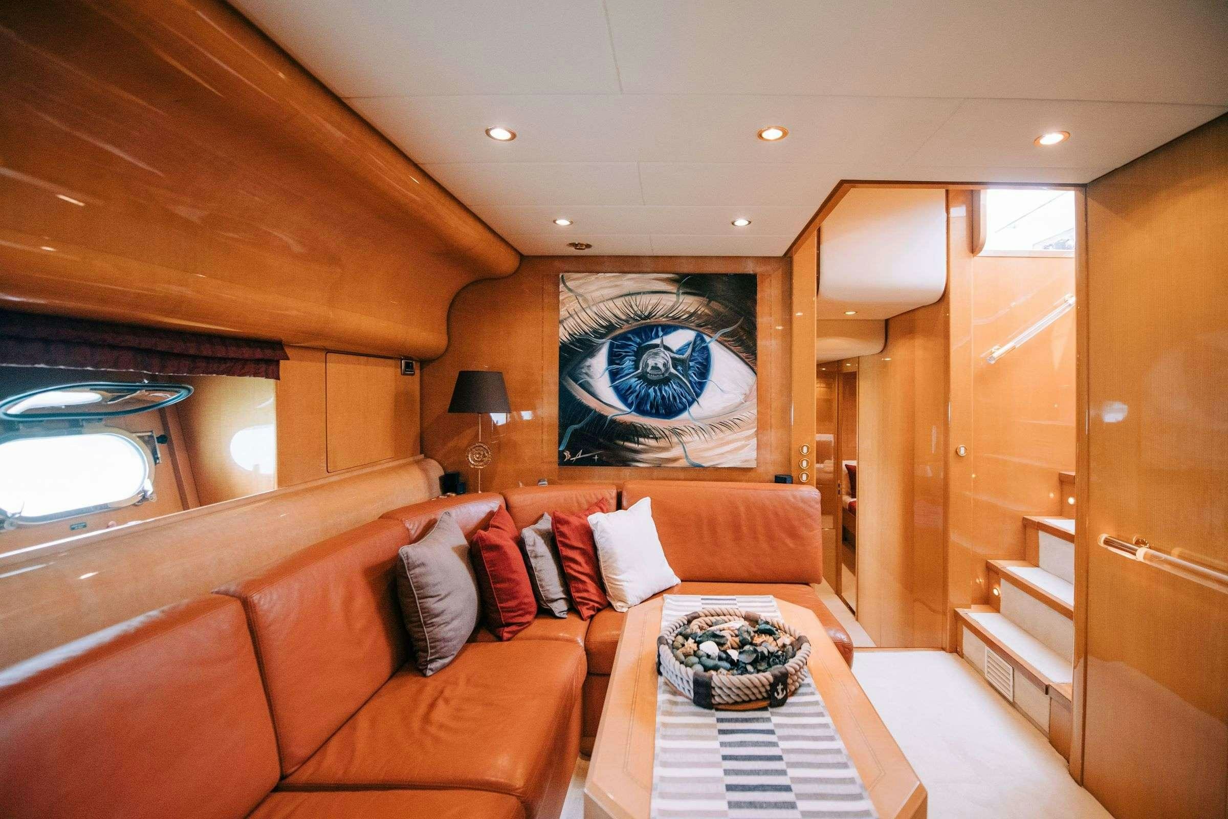 a room with a couch and a table aboard ROMACHRIS II Yacht for Charter