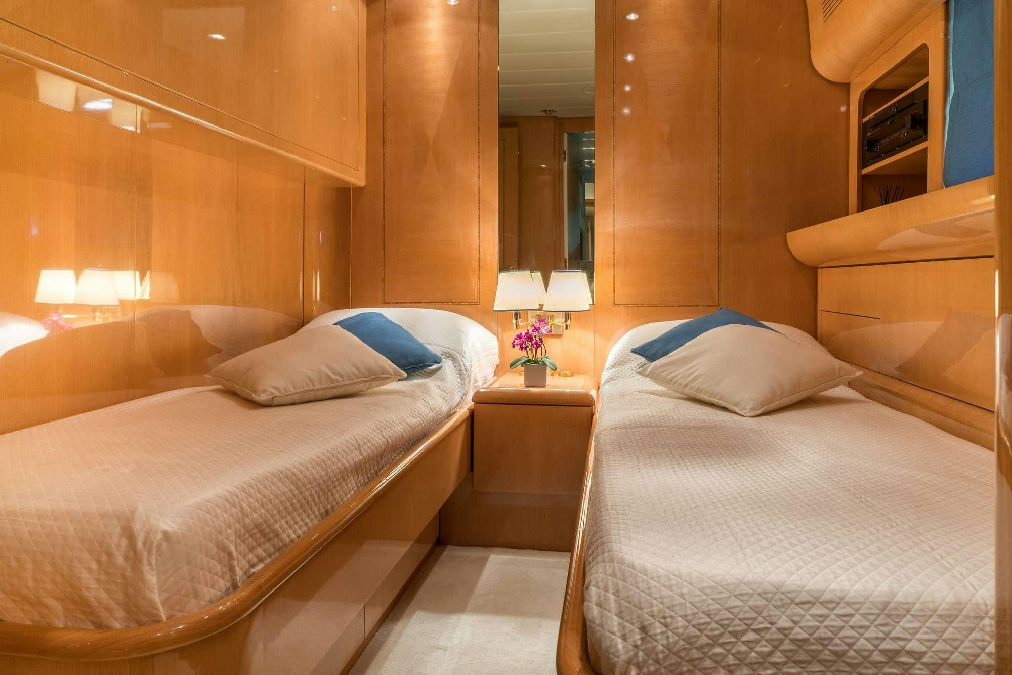 a room with two beds aboard ROMACHRIS II Yacht for Charter