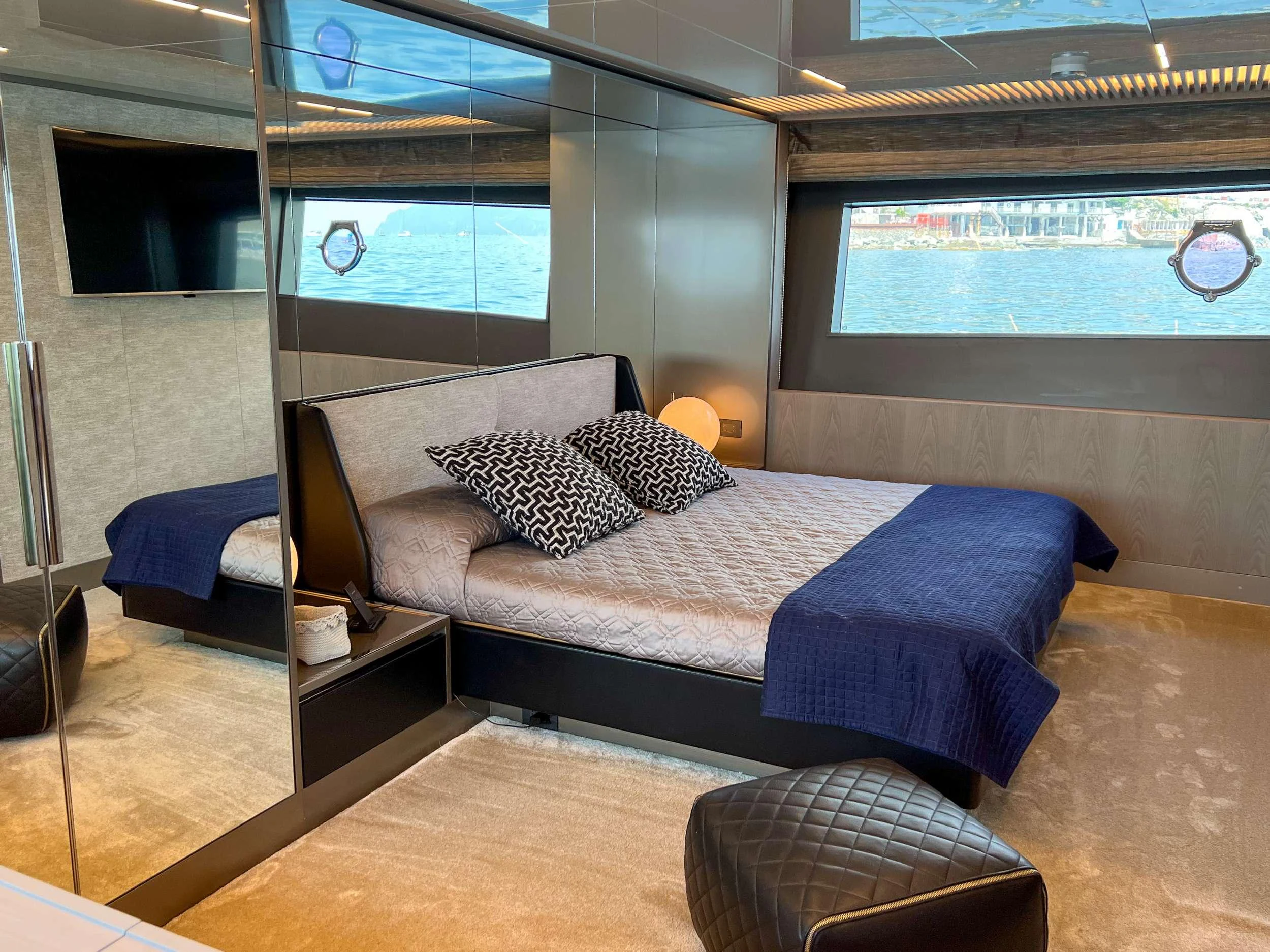 a bed in a room aboard E3 Yacht for Charter
