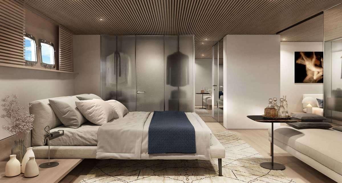 a room with a bed and a table aboard ANMAX Yacht for Charter