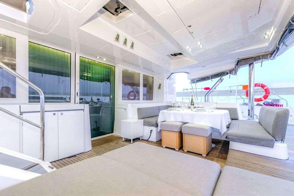 a large open modern looking room aboard GEMMA Yacht for Charter