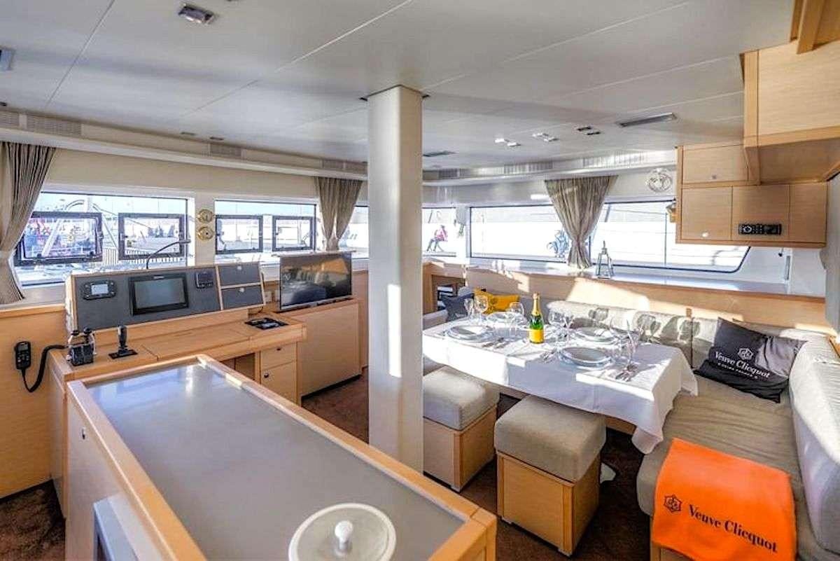 a large kitchen with a large island aboard GEMMA Yacht for Charter