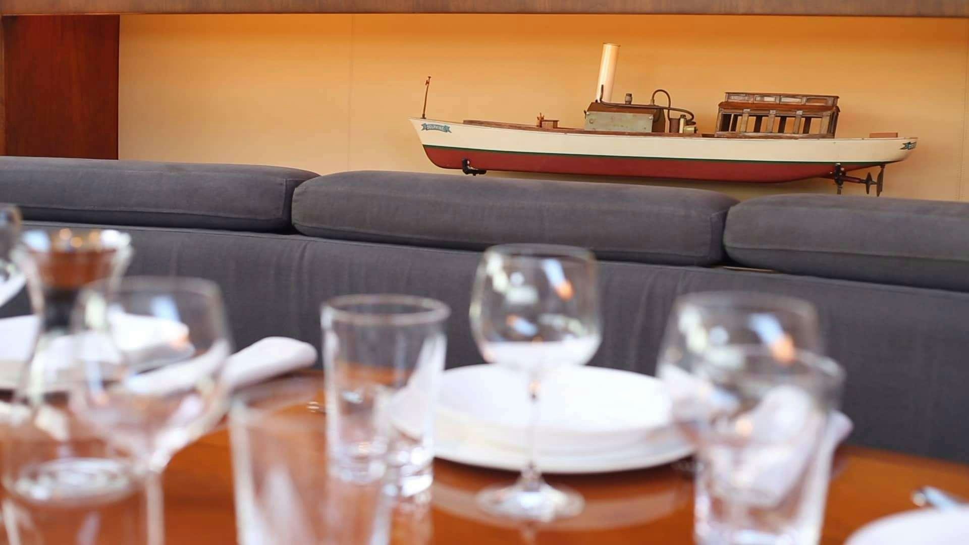 a piano on a table aboard Free at Last Yacht for Charter
