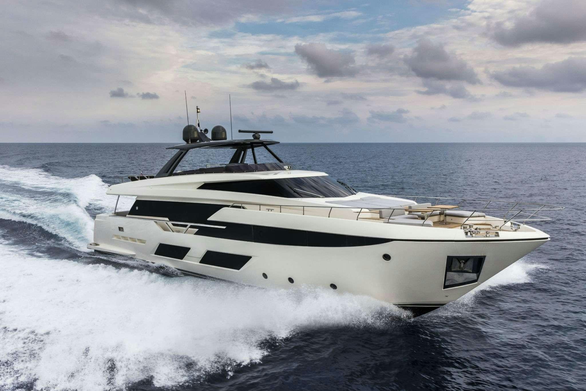 a white yacht on the water aboard 92' FERRETTI Yacht for Charter